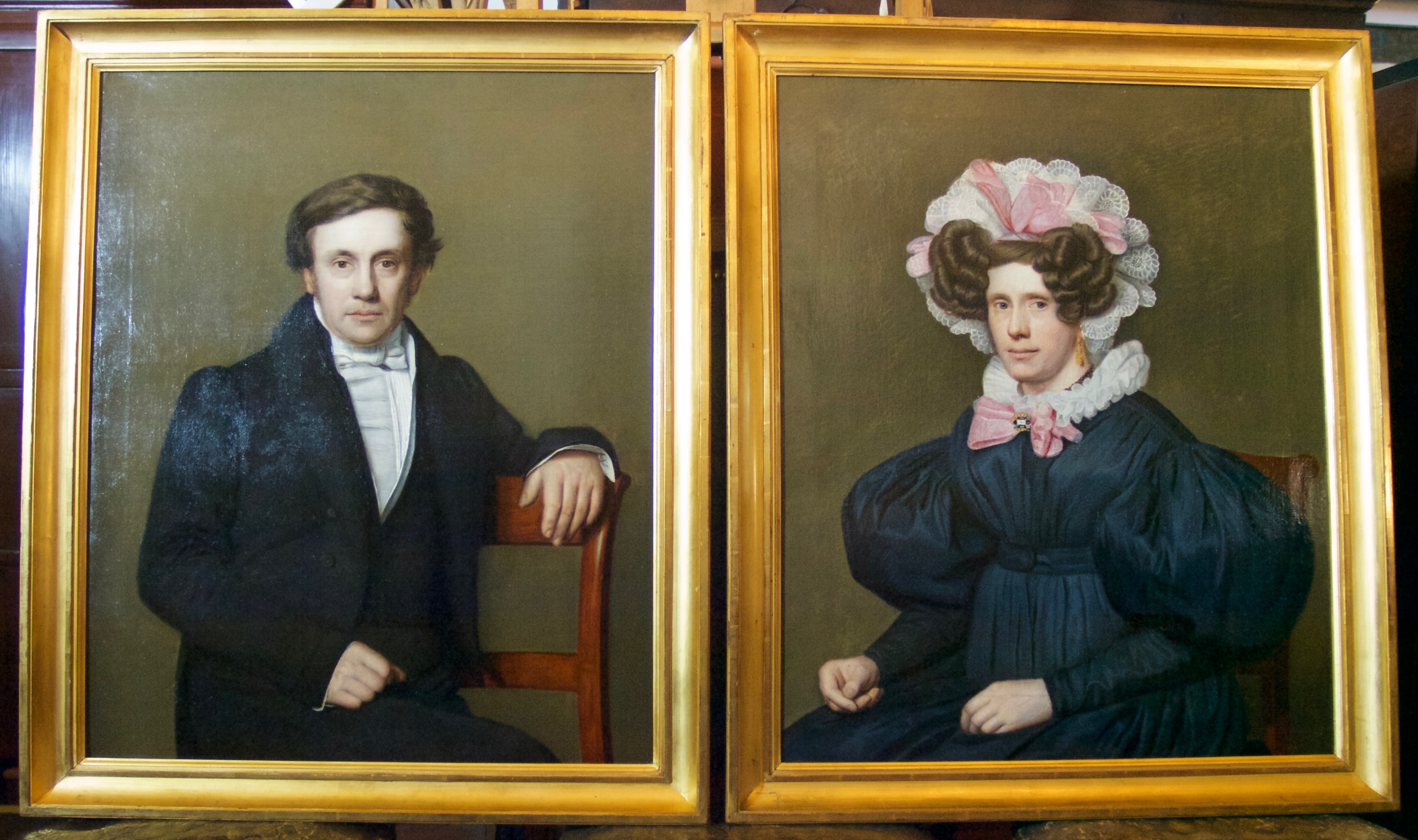 Portretten van CUJ Huber en M Offerhaus na restauratie.